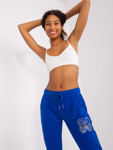 Hurtownia Kobaltowe spodnie dresowe z aplikacjami