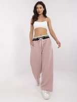 Brudnoróżowe dresowe spodnie z ozdobną gumą