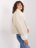 Hurt Jasnobeżowa damska kurtka zimowa z kieszeniami