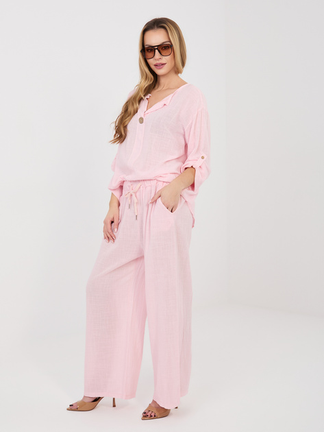 Jasnoróżowe letnie spodnie z wiązaniem