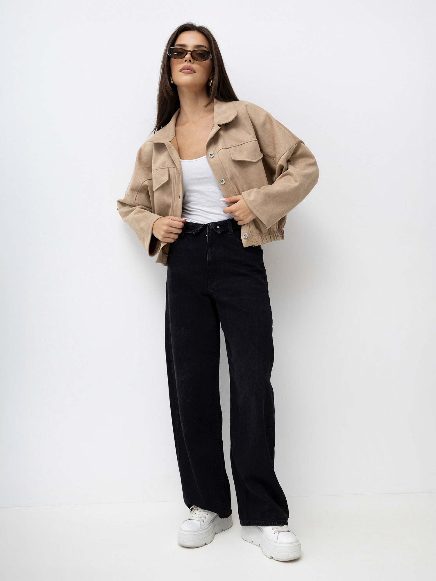 Camel shirt jacket with an elastic at the bottom.