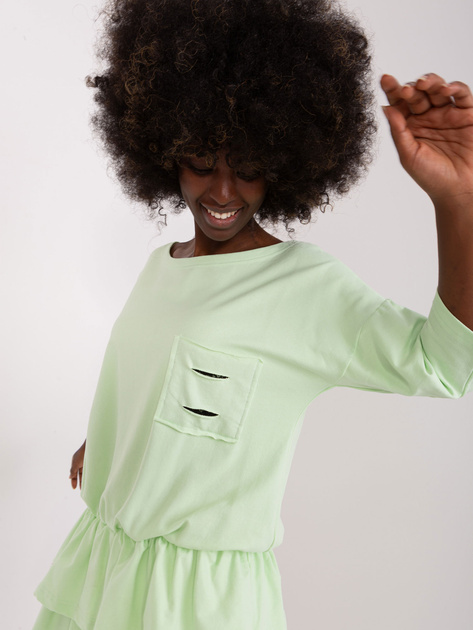 Hurt Pistacjowa rozkloszowana sukienka dresowa