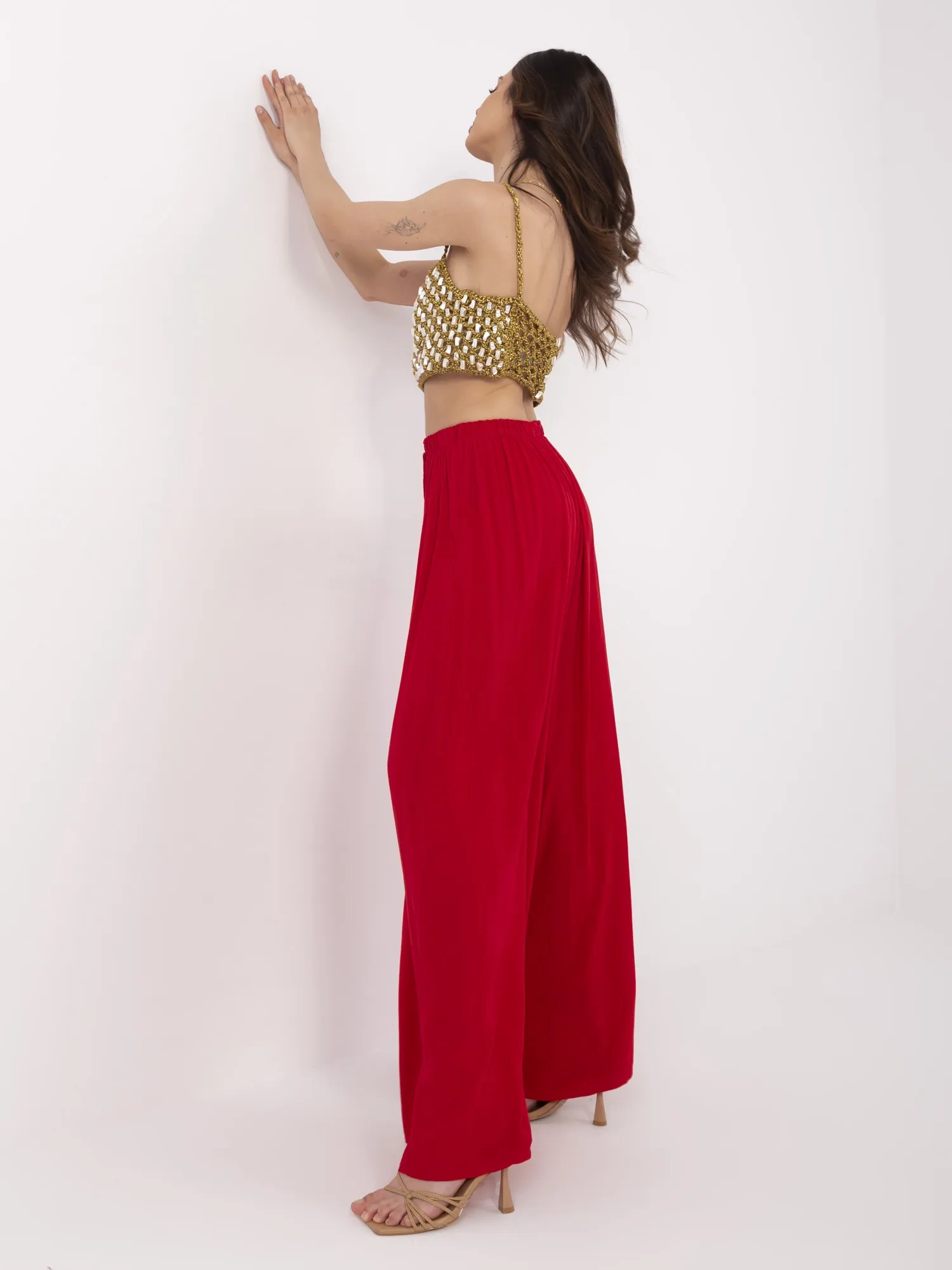 Red wide pleated pants.