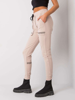 Jasnobeżowe spodnie dresowe z bawełny Winsley