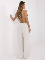 Jasnobeżowe spodnie palazzo bez zapięcia