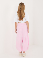 Jasnoróżowe  damskie spodnie alladynki z sztruksu