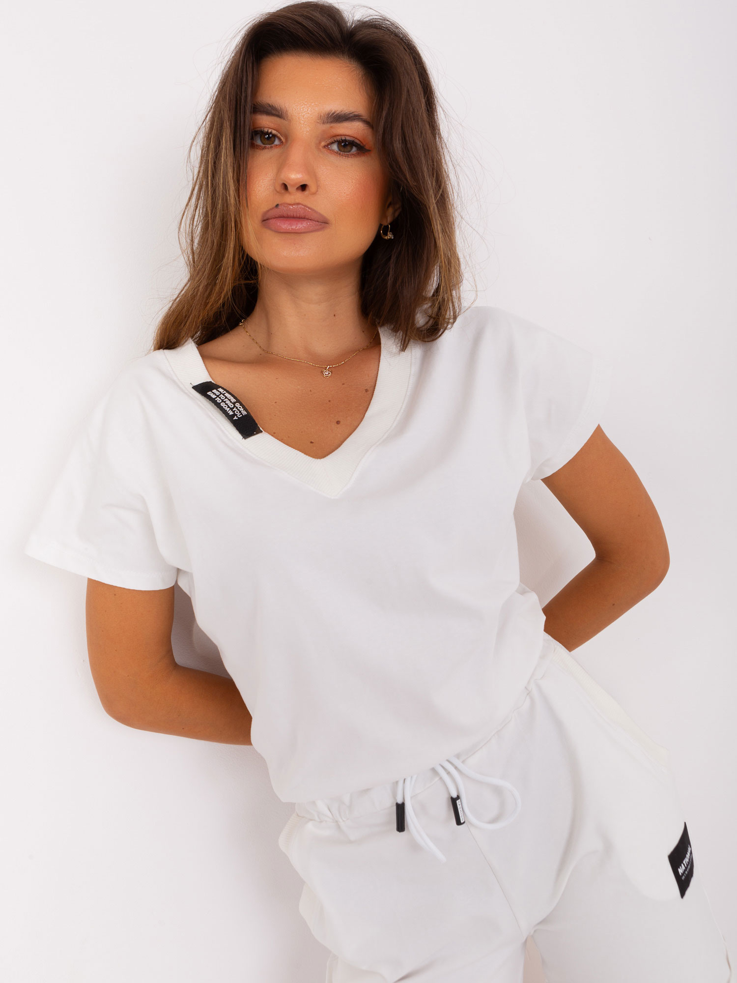 Großhandel Ecru Sweatshirt-Jumpsuit mit kurzen Ärmeln.