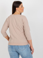 Hurtownia Beżowo-brązowa bluzka plus size z aplikacją