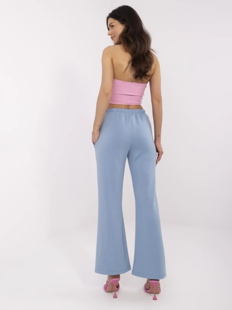 Niebieskie dresowe spodnie dzwony z przeszyciami