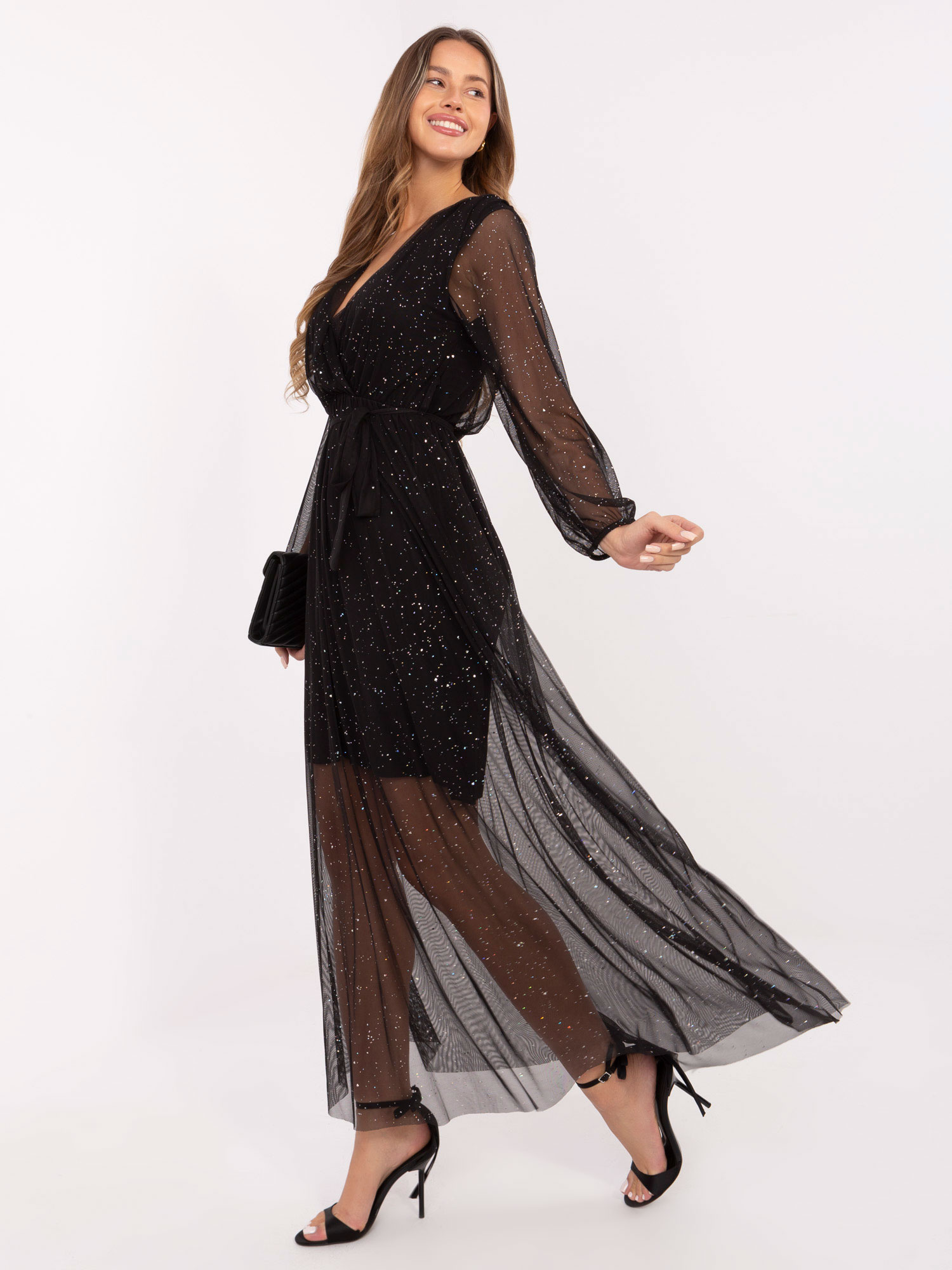 Black evening dress with a tied belt.