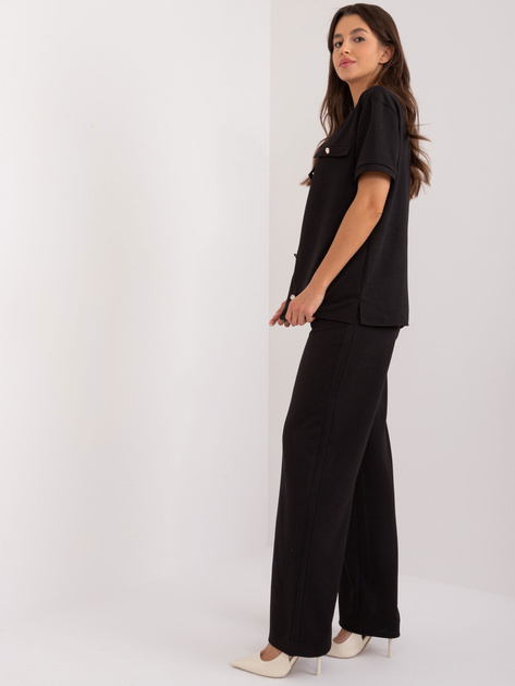 Hurt Czarny komplet casualowy z bluzką z rozcięciami