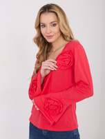 Koralowa bluzka z falbankami przy rękawach