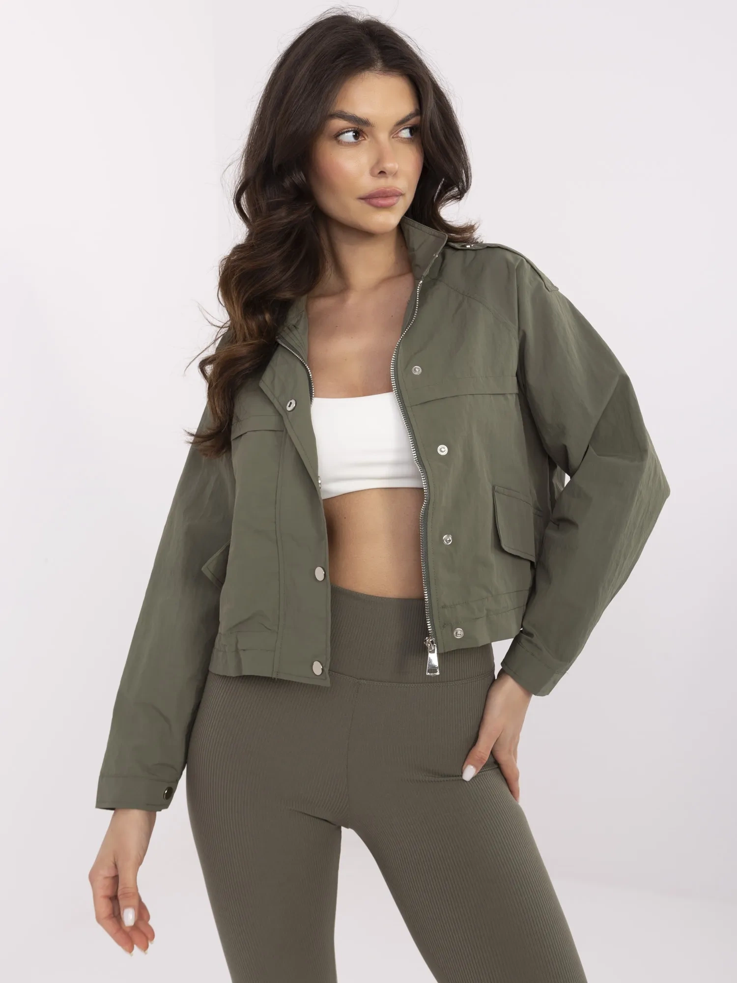 Khaki short windbreaker jacket without a hood.