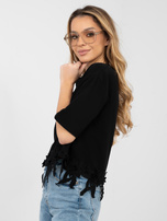 Juoda oversize palaidinė su gėlių aplikacija.