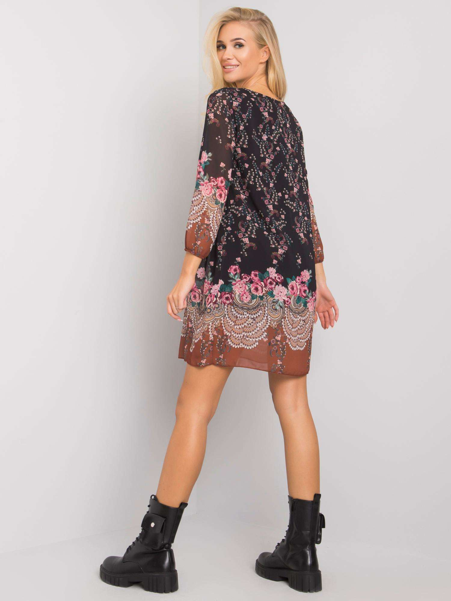 Schwarzes Kleid mit Mustern von Tristan OCH BELLA.