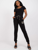 Czarne spodnie dresowe damskie slim fit z dżetami