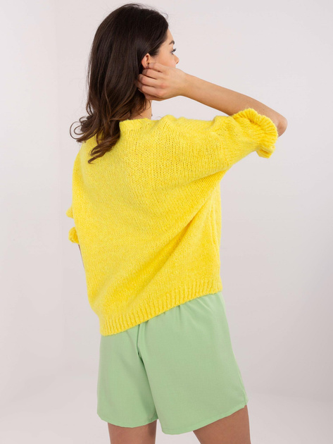 Hurt Żółty sweter oversize z falbankami przy rękawach