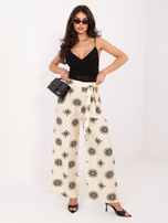Jasnobeżowo-czarne damskie spodnie palazzo na lato