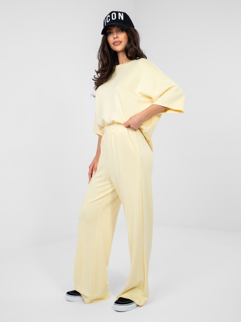 Pastelowe żółte spodnie wide leg z wysokim stanem RUE PARIS 