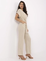 Beige summer women's jumpsuit made of muslin.