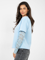 Jasnoniebieska bluzka oversize z koronką
