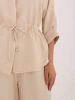 Beige summer set with a drawstring at the waist.