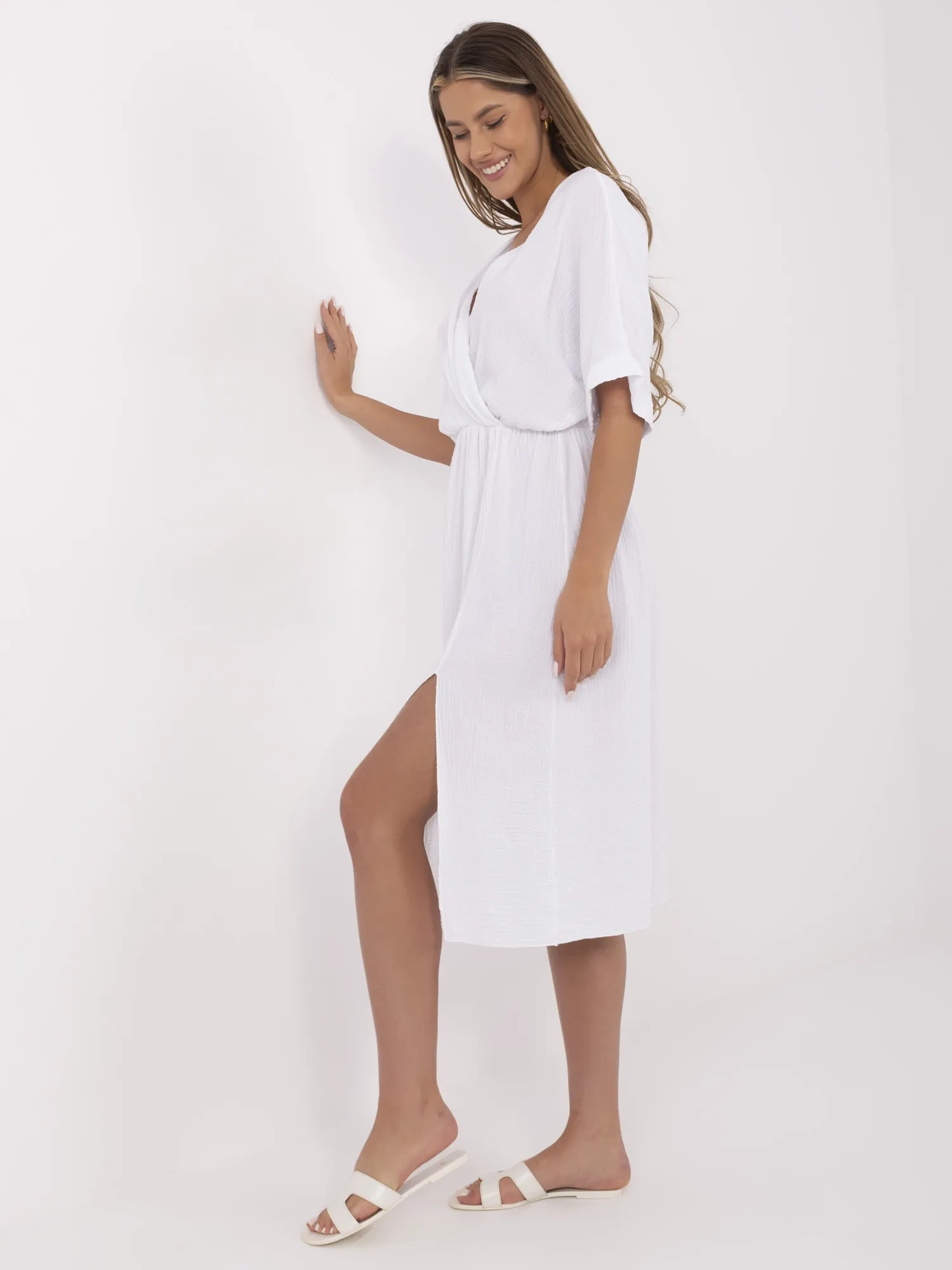 White muslin dress with short sleeves.