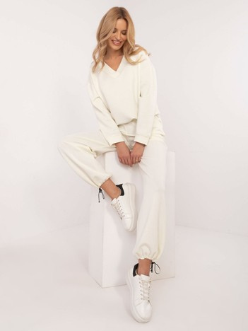 Hurtownia Kremowy dresowy komplet ze ściągaczami