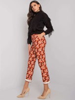 Ciemnopomarańczowe spodnie we wzory Dorchester