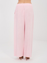 Jasnoróżowe letnie spodnie z wiązaniem 