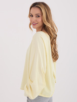 Jasnożółta bluzka oversize z bufiastym rękawem 