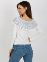 Beige-gray short blouse with exposed shoulders.