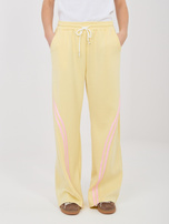 Pastelowe żółte dresowe spodnie z kieszeniami RUE PARIS 