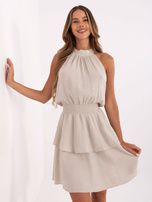 Beige flared dress made of muslin.