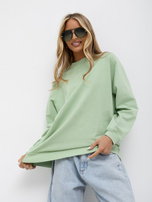 Pistazienfarbener Oversize-Sweatshirt aus Baumwolle.