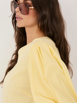 Jasnożółta bluzka oversize z krótkim rękawem
