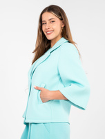 Miętowy krótki płaszcz z piankowego materiału 