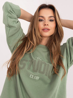 Pistacjowa bluza oversize z kontrastowym napisem 
