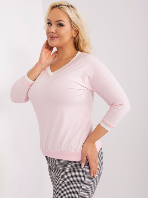 Hurt Jasnoróżowa gładka bluzka plus size ze ściągaczami