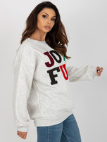 Hurtownia Jasnoszara luźna bluza bez kaptura z napisem