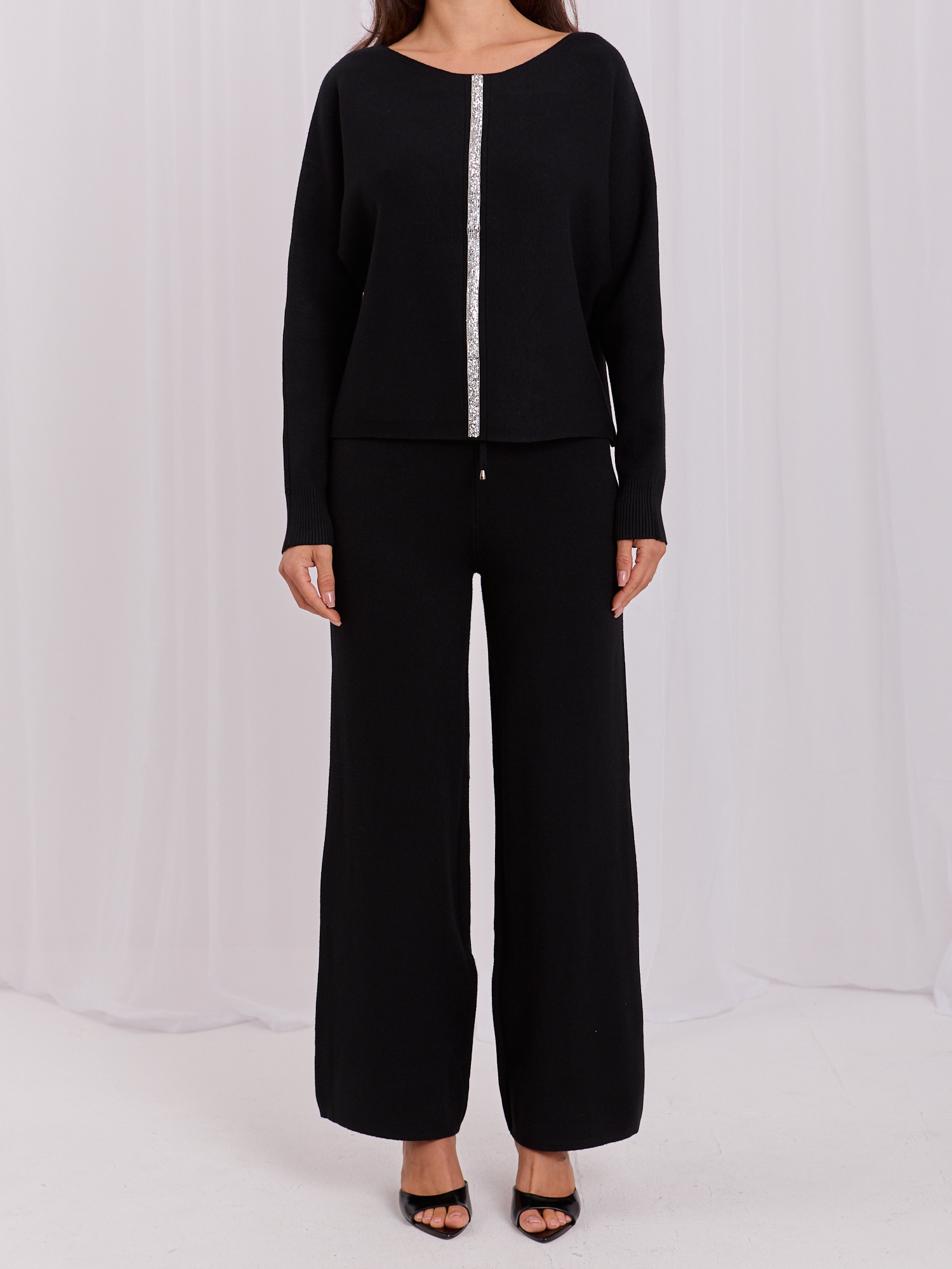 Black knit set with pants.