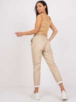 Beżowe spodnie z ekoskóry z kieszeniami Lana