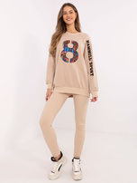 Hurt Beżowy dwuczęściowy komplet z legginsami