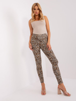 Hurt Beżowo-czarne legginsy na co dzień z nadrukiem zwierzęcym