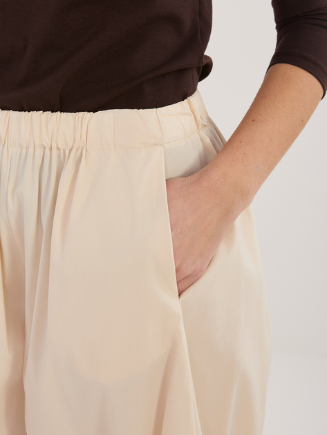 Jasnobeżowe spodnie parachute z kieszeniami RUE PARIS