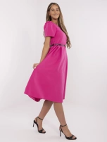Fuchsia midi dress with a black belt.