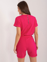 Fuchsia cotton jumpsuit with a V-neck.