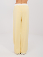 Jasnożółte dresowe spodnie wide leg RUE PARIS 
