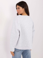 Světle šedá melírovaná oversized mikina s nápisem.