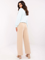 Hurt Beżowe dresowe spodnie z przeszyciem w kant